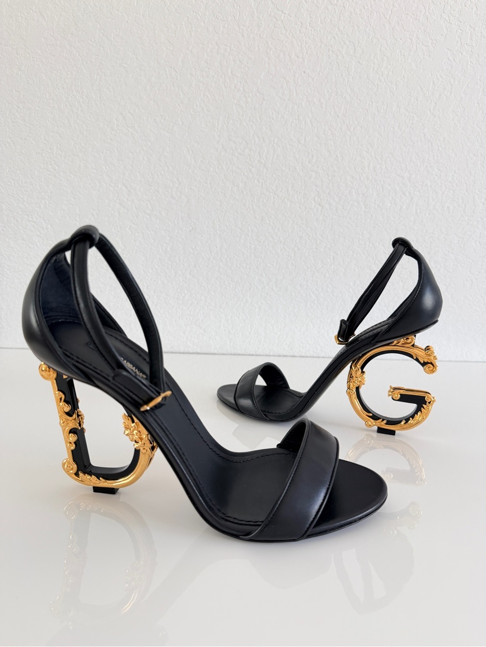 Dolce Gabbana Black Leather High-Heel Sandals with Gold Decorative Heel